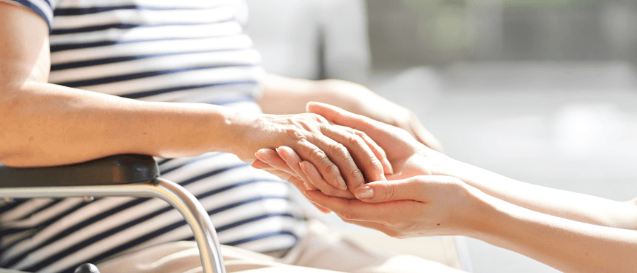 Holding seniors hand
